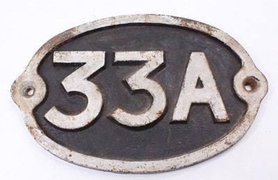 Lot 175 - A cast iron railway interest No. 33A shed...