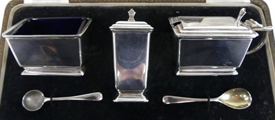Lot 90 - A late Art Deco silver three-piece condiment...