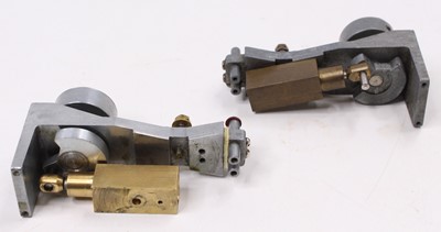 Lot 76 - A pair of USE vertical single cylinder steam...