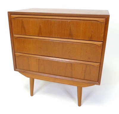 Lot 337 - A 1960s Danish teak low chest of three long...
