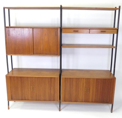 Lot 338 - A 1960s Danish teak double modular wall...