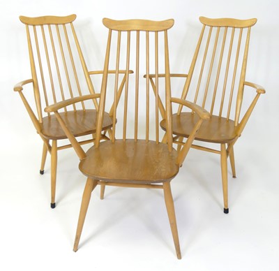 Lot 303 - A set of three 1960s Ercol blond elm...