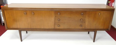Lot 300 - Ernest Gomme for G-Plan - a 1960s walnut long...