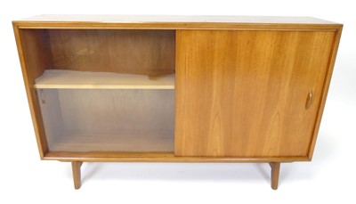 Lot 357 - Herbert E Gibbs - a 1960s teak low...