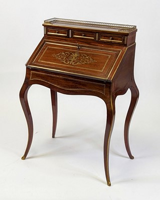 Lot 1542 - A circa 1900 French mahogany and brass inlaid...