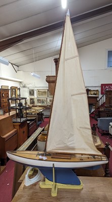 Lot 89 - A very well made 1960s wooden hull pond yacht,...