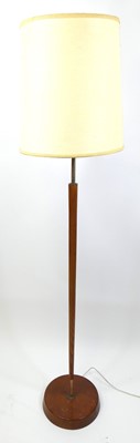 Lot 342 - A 1970s teak and rodded metal standard lamp,...