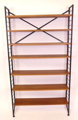 Lot 340 - A 1970s Ladderax teak and black painted metal...