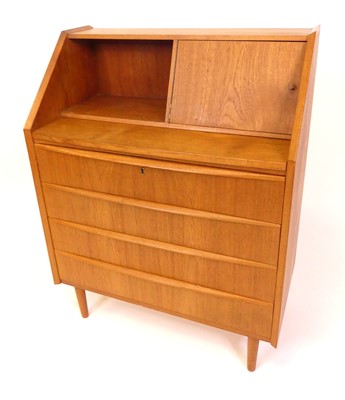 Lot 362 - A 1970s Danish teak slopefront bureau, having...