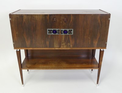 Lot 325 - A 1970s Danish rosewood double door side...
