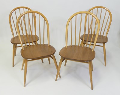 Lot 306 - A set of four Ercol blond elm Windsor dining...