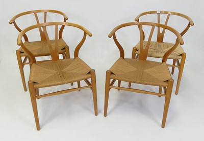Lot 379 - After Hans Wegner - a set of four contemporary...
