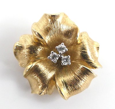 Lot 2687 - A yellow metal diamond set stylised flower...