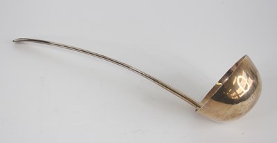 Lot 72 - An Irish silver soup ladle in the Art Deco...