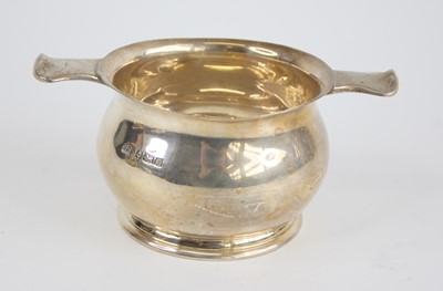 Lot 80 - A 1960s silver quaich, of typical squat...