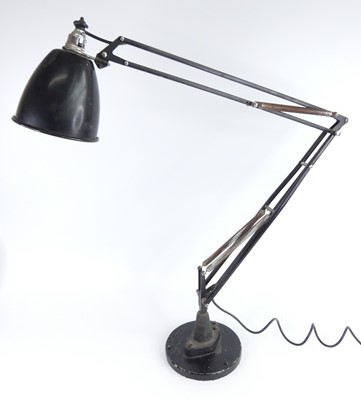 Lot 117 - A 1940s anglepoise black painted metal desk...