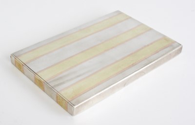 Lot 3409 - A George V Cartier silver, silver-gilt and...