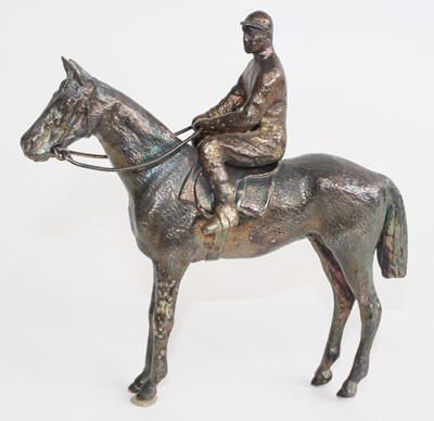 Lot 3408 - A silver equestrian figure group of a horse...