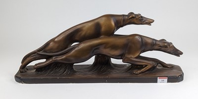 Lot 10 - An Art Deco gilt plaster model of two...