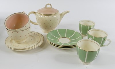 Lot 66 - A Susie Cooper part tea service on a cream...