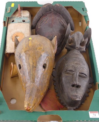 Lot 74 - A carved wooden dance/initiation mask,...