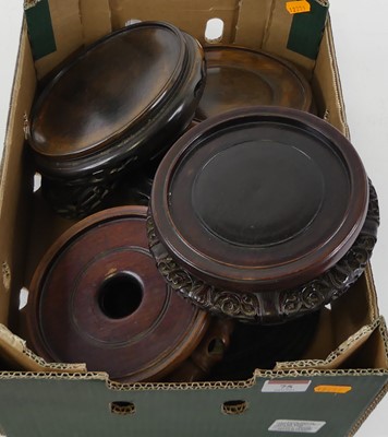 Lot 75 - A Chinese hardwood vase stand, having a...