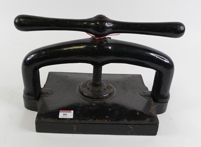 Lot 80 - A cast iron book press