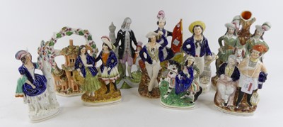 Lot 103 - A pair of Victorian Staffordshire flat back...