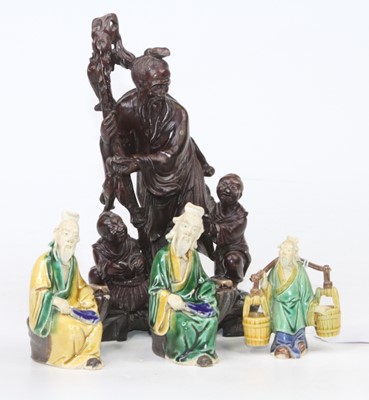 Lot 222 - A collection of three Chinese Sancai glazed...