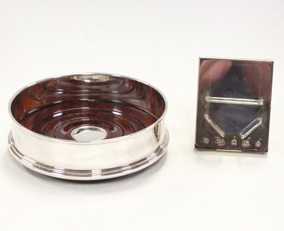 Lot 231 - A Carr's silver mounted bottle coaster,...