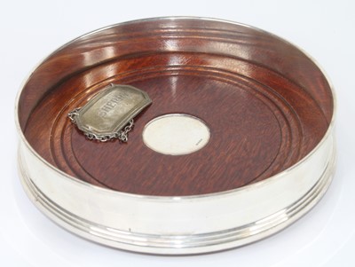 Lot 252 - An Elizabeth II silver mounted wooden bottle...