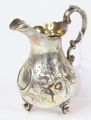 Lot 256 - A Victorian silver cream jug, of baluster...