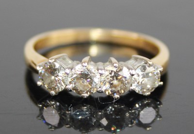 Lot 2722 - An 18ct yellow and white gold diamond...