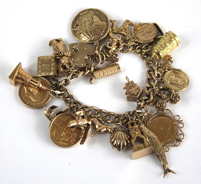 Lot 2400 - A 9ct gold curblink bracelet containing a...