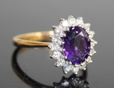 Lot 2484 - A contemporary 18ct gold, amethyst and diamond...