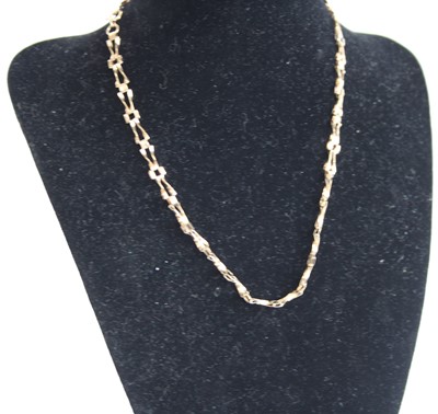 Lot 2452 - A yellow metal fancy link necklace, stamped...