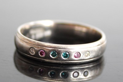 Lot 2466 - A palladium and multicolour diamond set half...