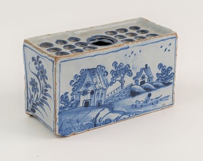 Lot 2082 - An English blue and white delftware flower...