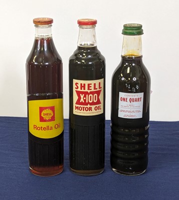Lot 4034 - A Shell Rotella oil bottle, quart to line (30);...