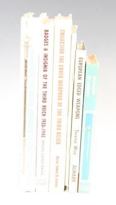 Lot 3195 - A collection of military related books to...