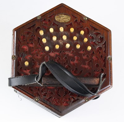 Lot 683 - A late Victorian concertina, of typical...
