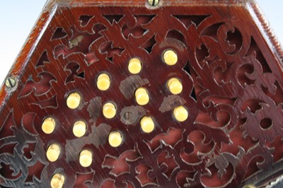 Lot 683 - A late Victorian concertina, of typical...