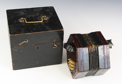 Lot 683 - A late Victorian concertina, of typical...