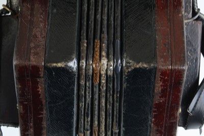Lot 683 - A late Victorian concertina, of typical...