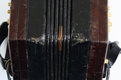 Lot 683 - A late Victorian concertina, of typical...