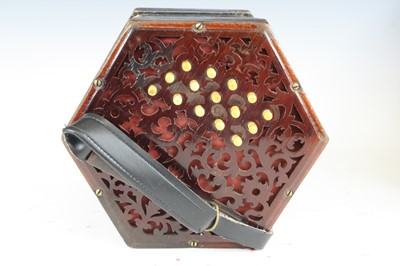 Lot 683 - A late Victorian concertina, of typical...