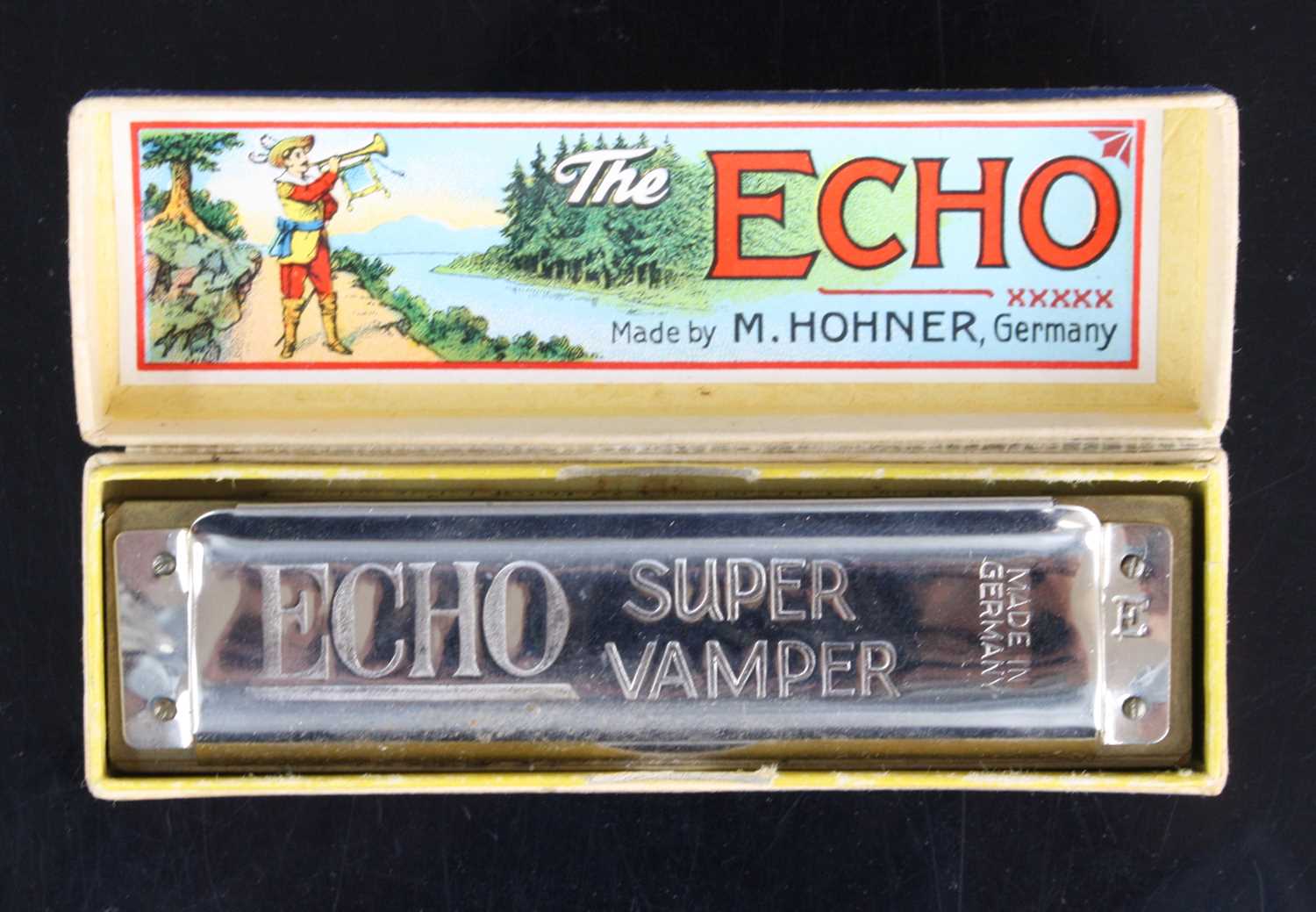 Lot 650 - An M. Hohner The Echo Super Vamper harmonica,