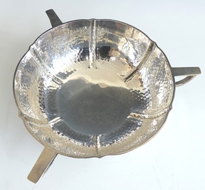 Lot 137 - An Arts & Crafts silver three-handled table...