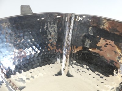 Lot 137 - An Arts & Crafts silver three-handled table...