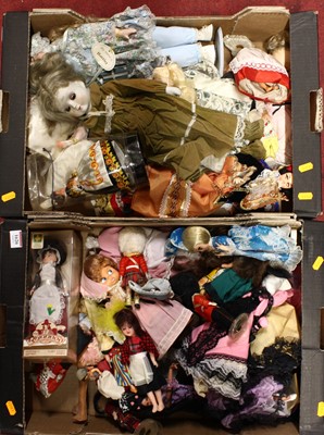 Lot 1574 - Two trays containing various foreign dolls and...